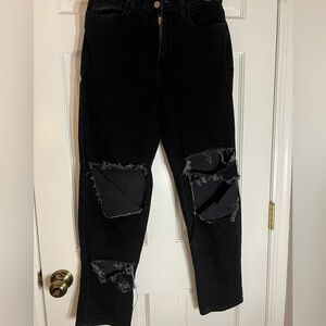 Vibrant black ripped jeans